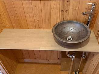 トイレリフォーム 来客に褒められる、和の空間に溶け込む手洗いカウンター